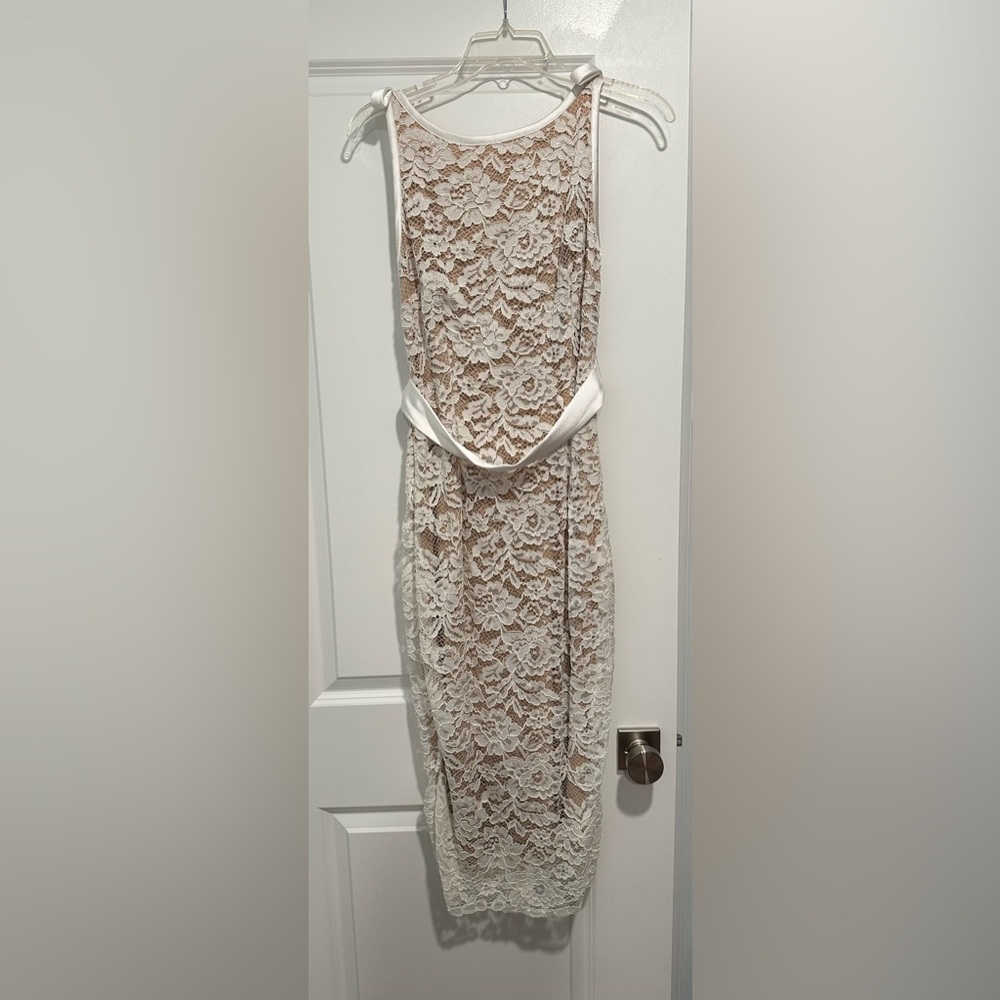 White and nude lace dress by ABS Allen Schwartz with bow shoulder